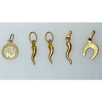 Four Hallmarked 18K Gold Charms and Another Unmarked