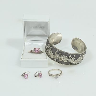 Sterling Silver Rings with Silver Coloured Earrings and a Cuff Bangle