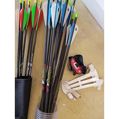Lot of Archery Equipment including Bows, Arrows, Quiver, and more