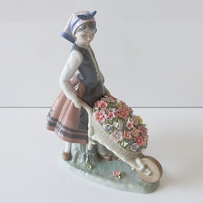 Lladro Figure of a Woman Pushing a Wheelbarrow