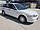 3/2000 Ford Laser LXi KN 5d Hatchback White 1.6L
