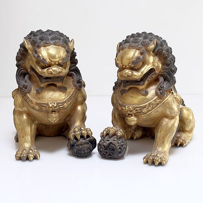 Pair of Chinese Gilt Bronze Buddhist Lions