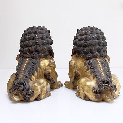 Pair of Chinese Gilt Bronze Buddhist Lions
