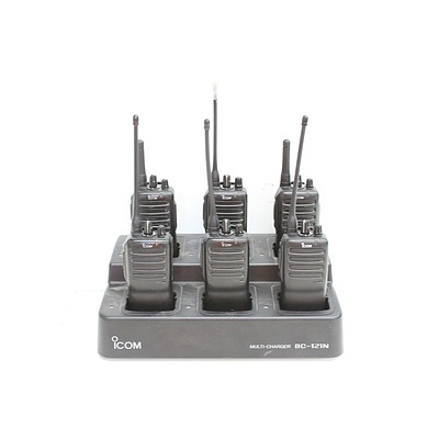 Six Icom IC-F24 Portable UHF/VHF Radios and Multi Charging Station
