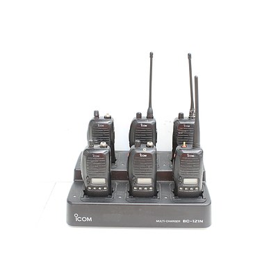Six Icom IC-F4GS Portable UHF Radios and Multi Charging Station