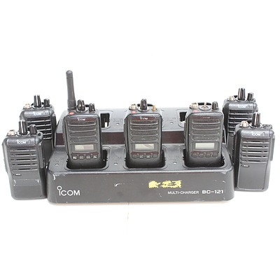Three Icom IC-F43GS and Four Icom IC-F4003 Portable UHF Radios and Accessories