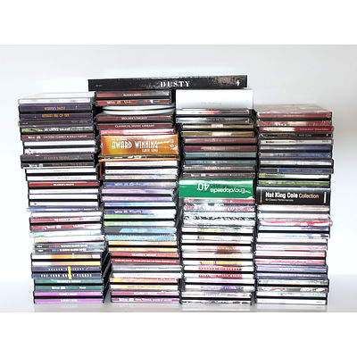 Large Collection of Cds and a Cd Rack