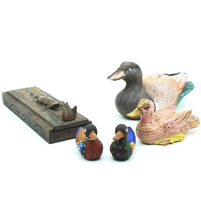 Four Eastern Carved and Polychrome Wooden Ducks and Eastern Carved Wooden Chopsticks in Relief Carved Box