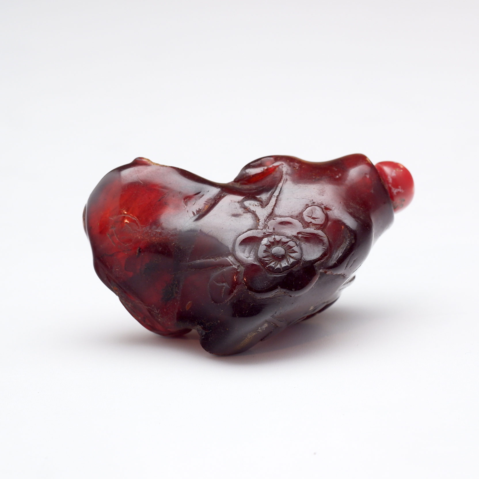 'Chinese Amber Resin Snuff Bottle Carved with Prunus'