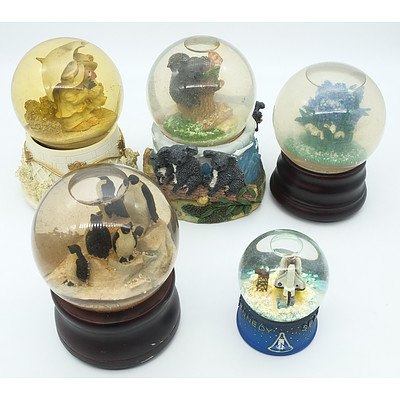 Group of Five Snow Globes