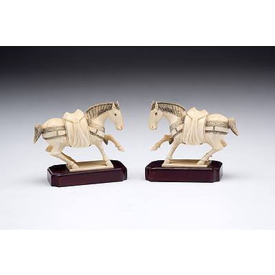 Pair of Chinese Finely Carved and Engraved Elephant Ivory Horses on Fitted Hardwood Stands, Early to Mid 20th Century
