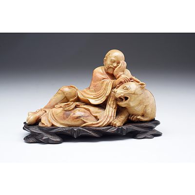 Fine Antique Chinese Carved Soapstone Model of a Luohan and Lion on Fitted Hardwood Stand, Early 20th Century