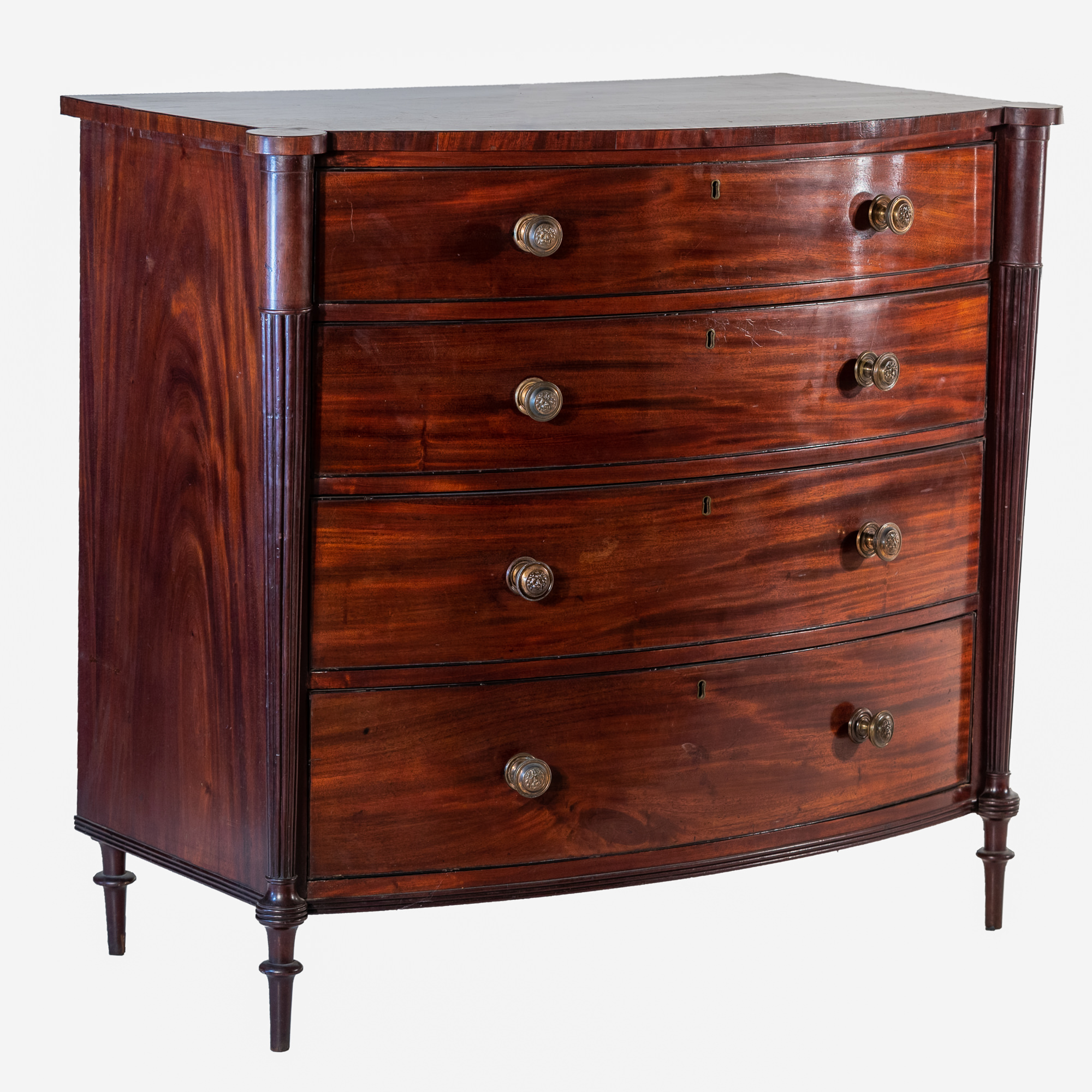 'Regency Mahogany and Ebony Strung Bowfront Chest with Tapered Fluted Pilasters in the Manner of Gillows Circa 1820'