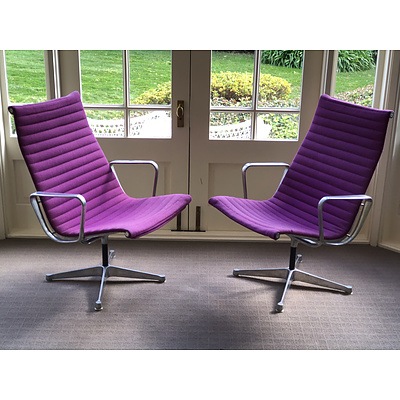 A Pair of Genuine Retro Eames Aluminum Group Model 124 Armchairs