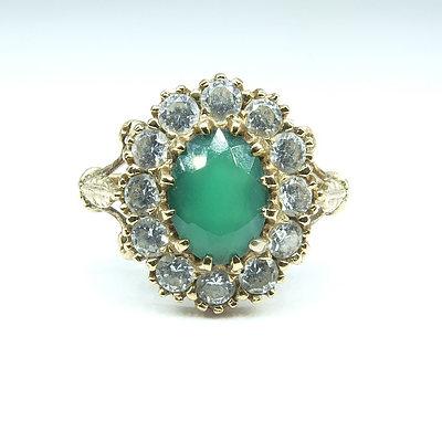 9ct Yellow Gold Oval Green Semi Precious Gem with Colourless Facetted Gems Around