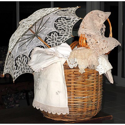Melange of Vintage and Antique Lace with Various Wicker Baskets and a Lace Parasol