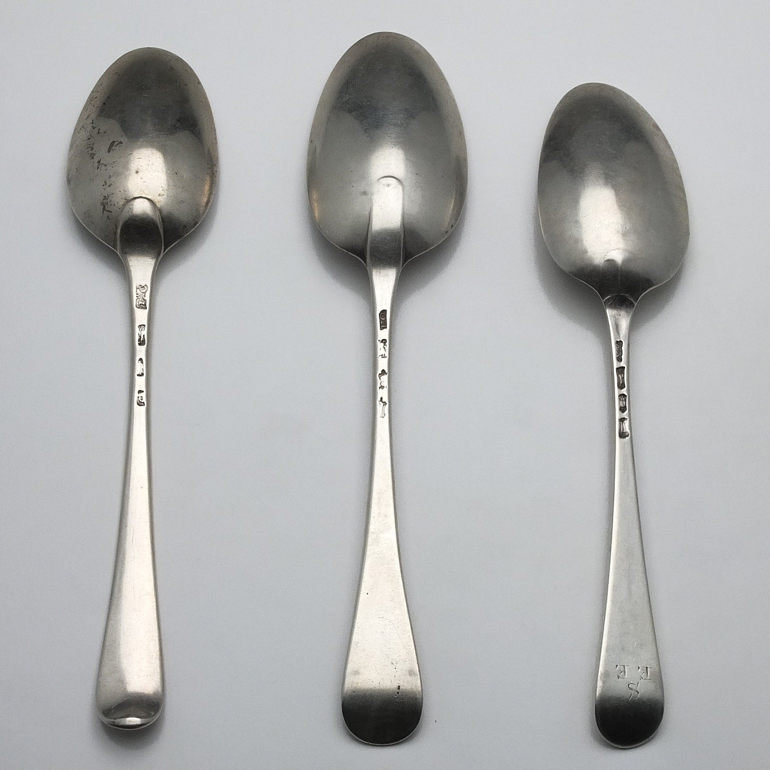 'Three Sterling Silver Table Spoons, Nicholas Hearnden London 1763, Thomas & William Chawner London 1770 and Elizabeth Oldfield London'