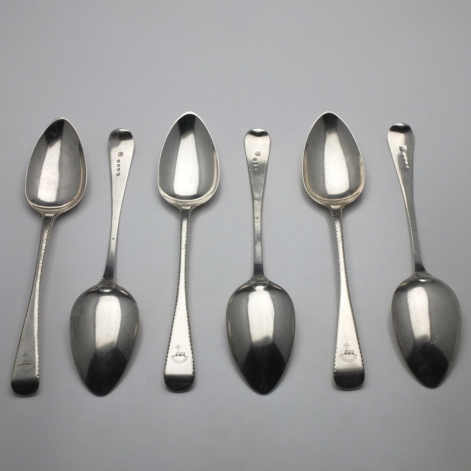 'Six Georgian Crested Sterling Silver Bright Cut Table Spoons Sarah & John William Blake London 1833'