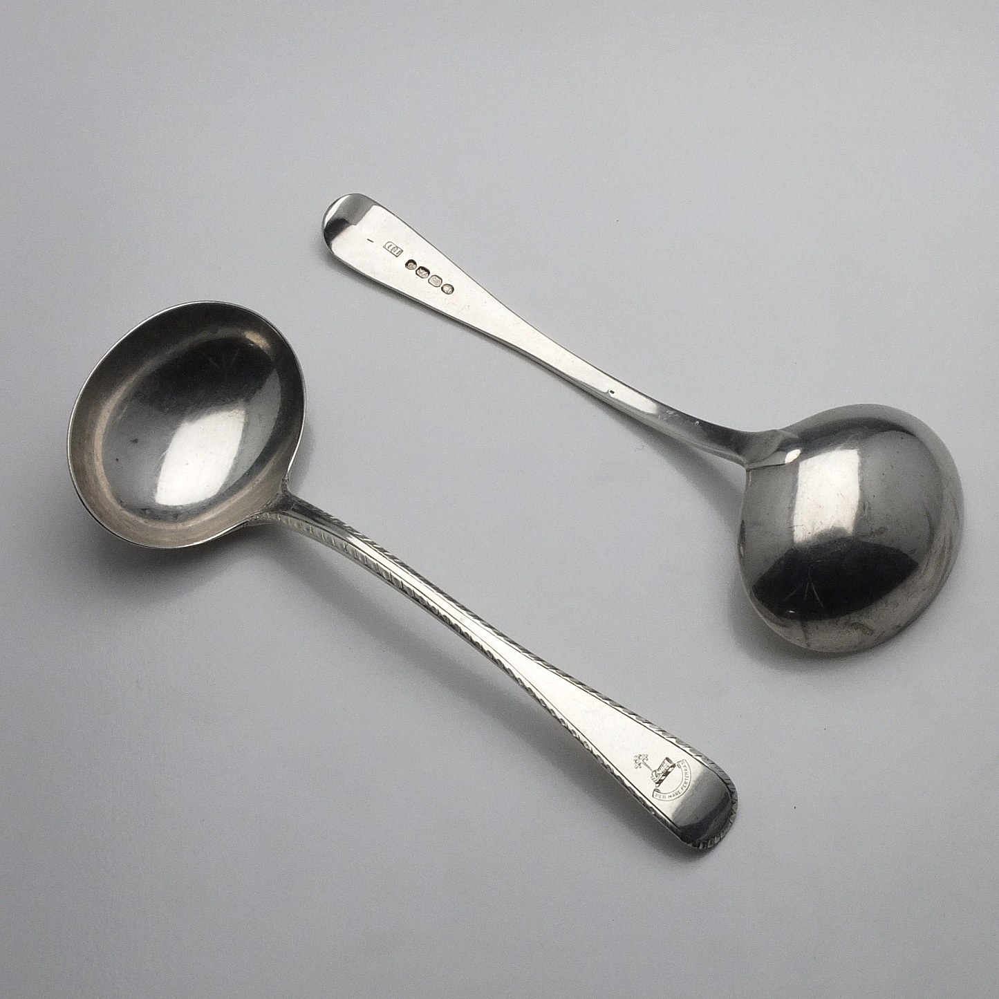 'Pair of George IV Crested Sterling Silver Bright Cut Ladles Thomas Dicks London 1822'