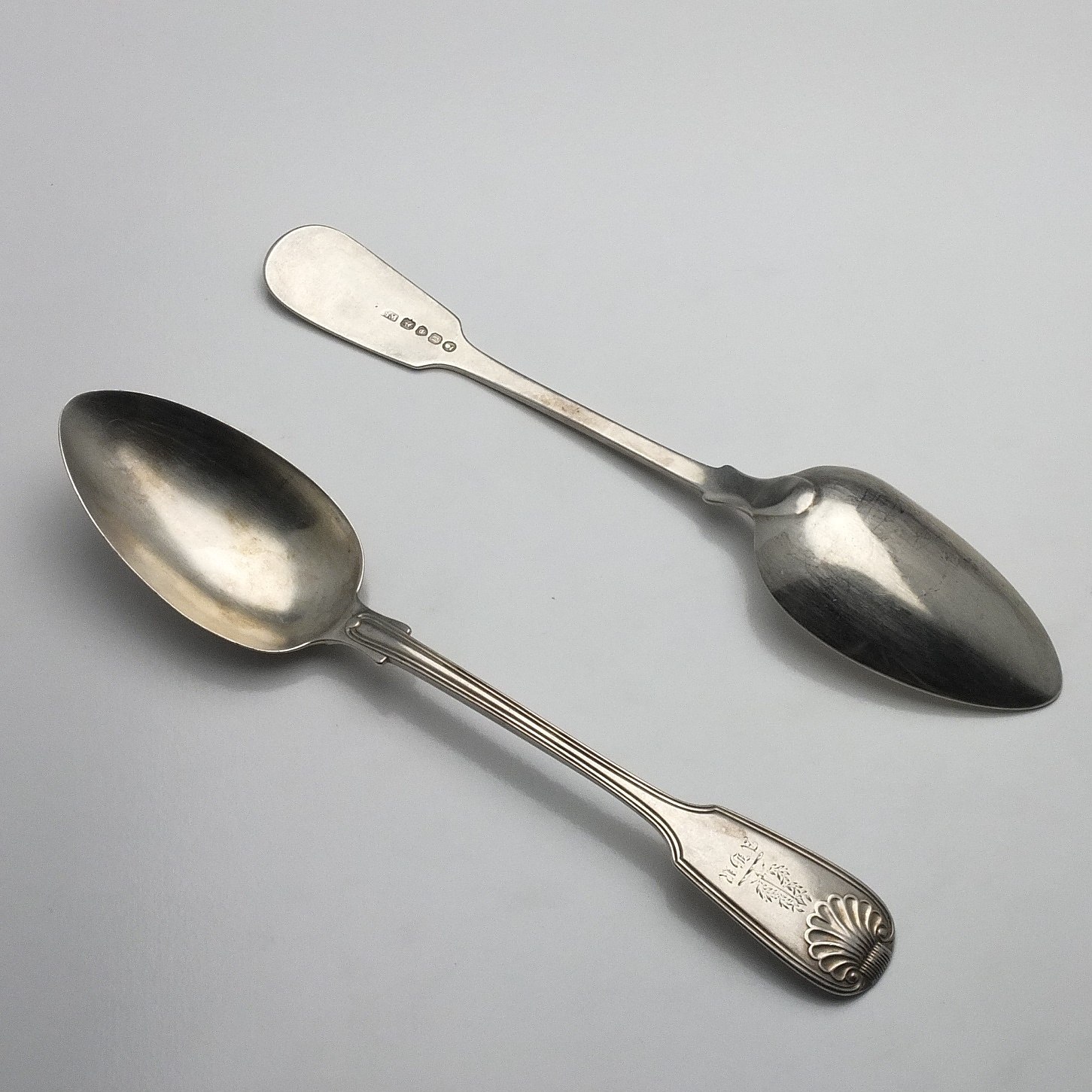 'Pair of Georgian Crested and Monogrammed Sterling Silver Serving Spoons William Schofield London 1828'