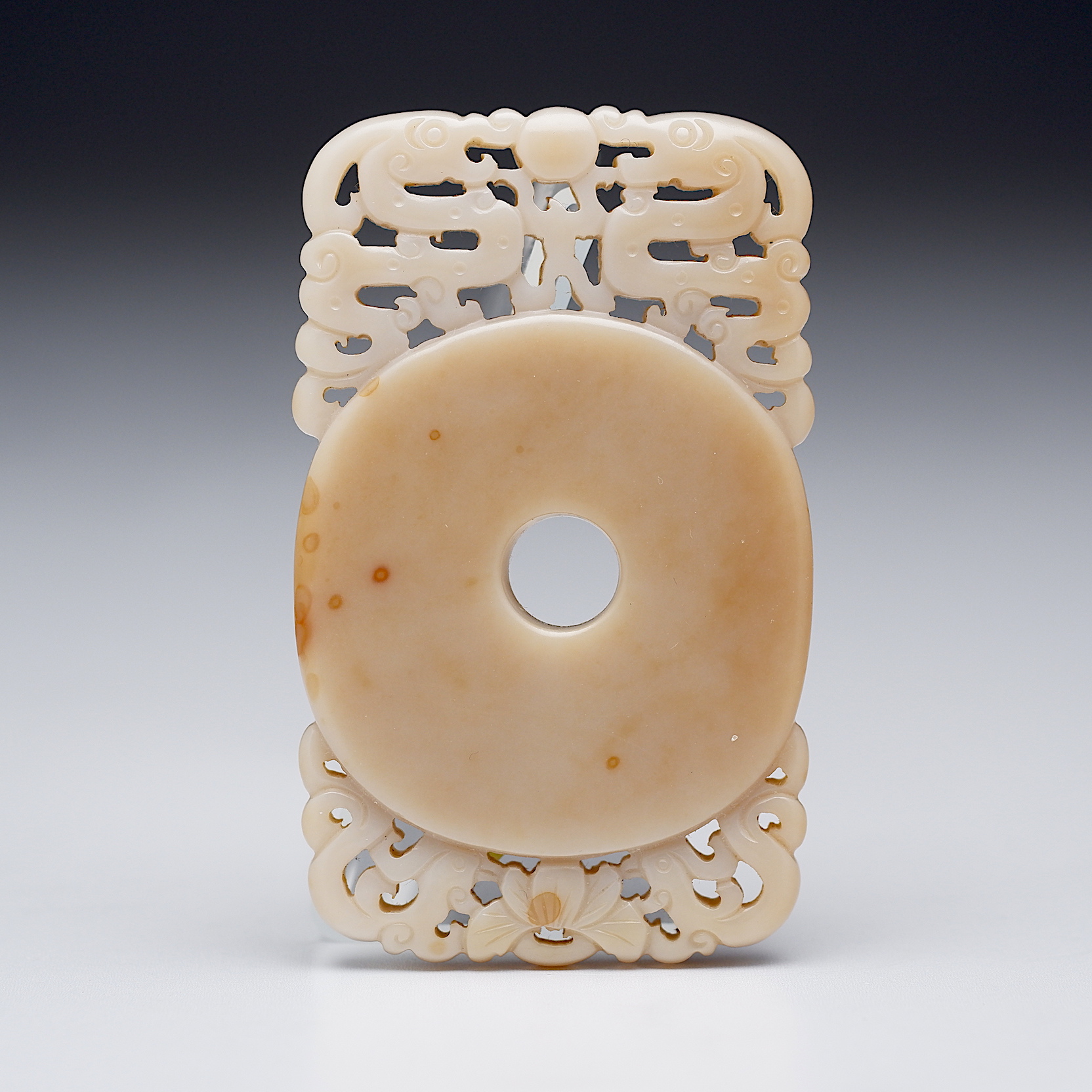 'Chinese Carved and Pierced Chalcedony Dragon and Phoenix Pendant, Qing Dynasty 18th or 19th Century'