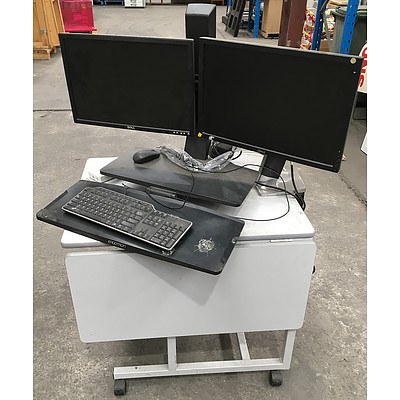 Mobile Workstation with Two Monitor Arms and Four Dell Monitors