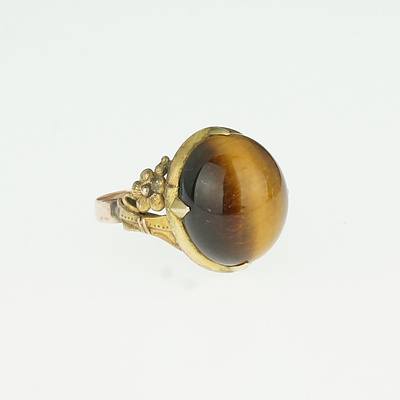 14ct Yellow Gold Ring with Oval Cabochon of Tiger Eye in Four Claws with Decorative Shoulders