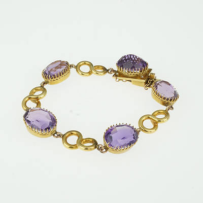 9ct Yellow Gold Bracelet with Five Oval Amethyst Links Alternating with Four Figure Eight Links