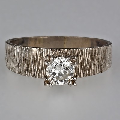 9ct White Gold Ring with Round Brilliant Cut Diamond in A High Four Triple Claw Setting
