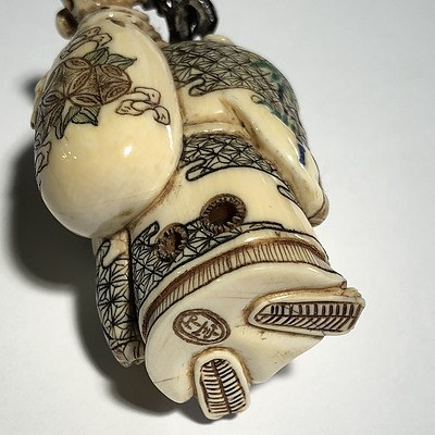 Japanese Carved and Stained Ivory Nestuke