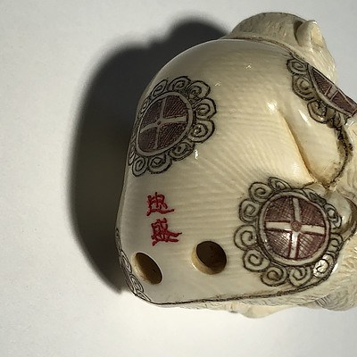Japanese Carved and Stained Ivory Netsuke of a Monkey