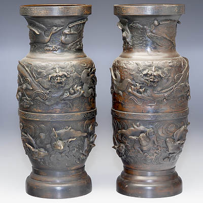 Impressive Pair of Japanese Relief Cast and Chased Bronze Vases, Meiji Period 1868-1912