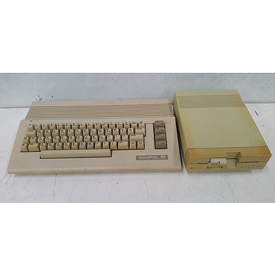 Commodore 64 Personal Computer w/ 1541-II Floppy Disk Drive & Assorted Floppy Disks