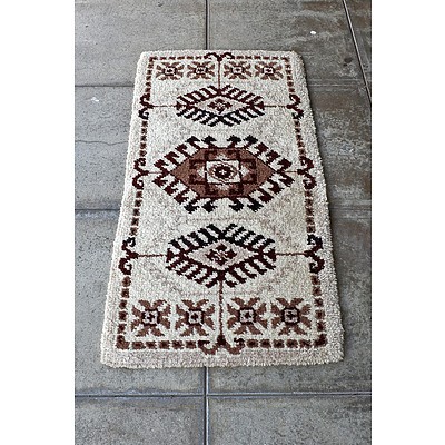 Pair of Small Nepalese Hand Knotted Wool Pile Rugs