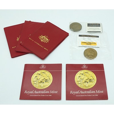 1981, 1981 and 1982 Red Wallet Uncirculated Coins Sets, Two 1984 Uncirculated $1 Coins and Two 1988 $5 Commemorative Coins