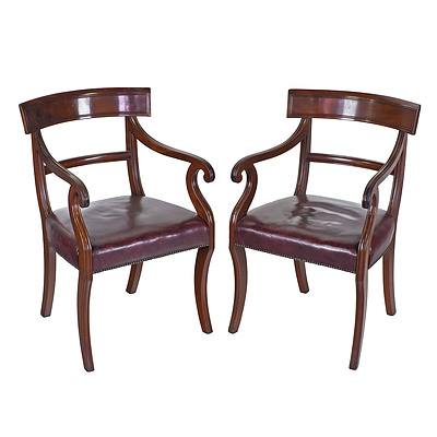 Pair of Regency Mahogany Arm Chairs with Sabre Legs and Scrolled Arms 19th Century