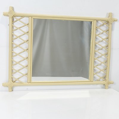 An Antique Sculpted Edge Mirror, Painted Cane Frame Mirror, and Ash Framed Mirror