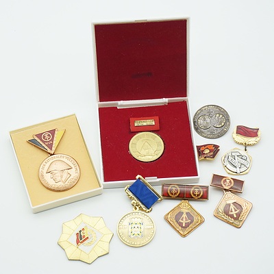 Group of Soviet and Russian Medals, Badges and Tokens