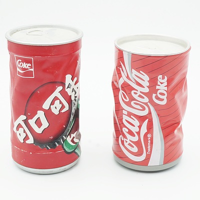 Two Coca Cola Dancing Cans