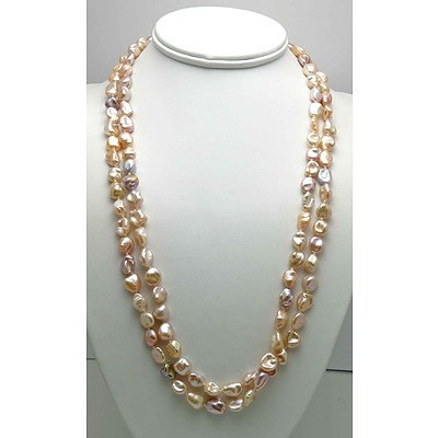 Triple length strand of Keshi Pearls