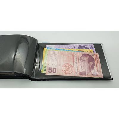 Booklet with Assorted Foreign Banknotes Including Fijian, American, Indonesian Notes and More