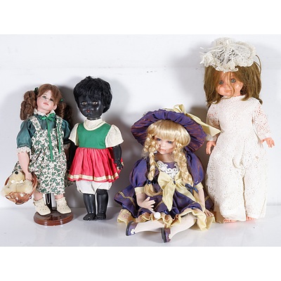 Group of Four Porcelain Dolls