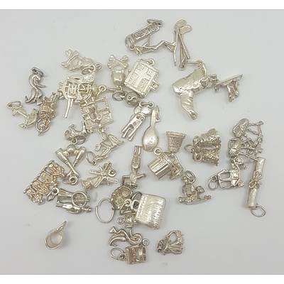 Quantity of over 30 New Sterling Silver Charms