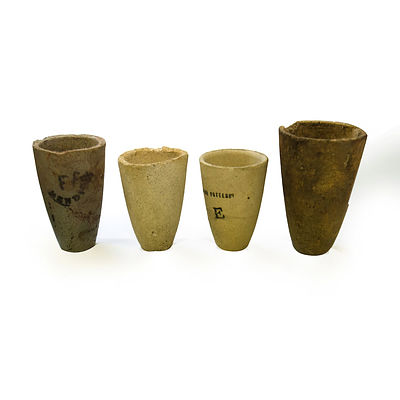 Group 19th C Bottles & Crucibles. Three glass bottles, one green torpedo bottle, one coblat bottle, one marked 'St Jakobs Oel,' one stoneware ginger beer bottle , two ink bottles; & eight crucibles 