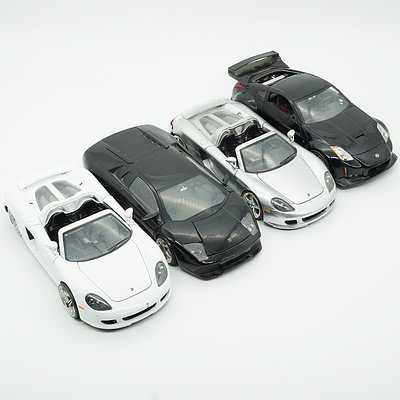 Four Jada 1:24 Model Cars, Including Porsche Carrera GT, Lamborghini Murcielago, Porsche Carrera GT and 2003 Nissan Z