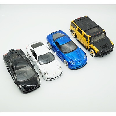 Four 1:24 Model Cars, Including Jada Lamborghini Gallardo Superleggera, Jada Porsche 911 Turbo, Jada Hummer and Jada Corvette Z06