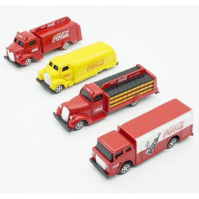 Four Coke Cola Model Trucks