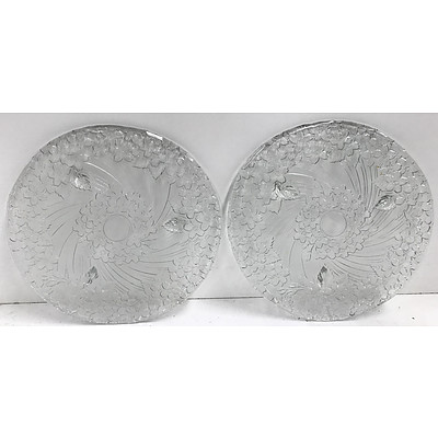 Set of 2 round serving platers with embossed floral design