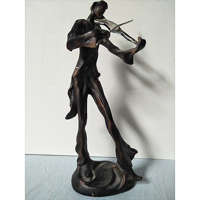 Statue of Man Playing Violin