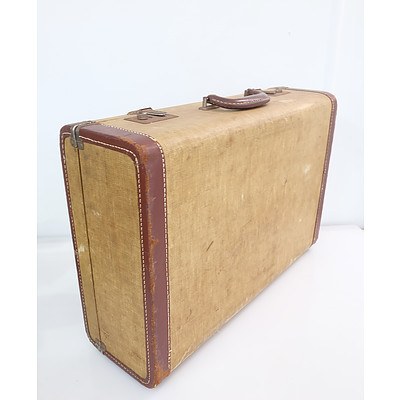 Vintage Suitcase with Various Sheet Music and Books